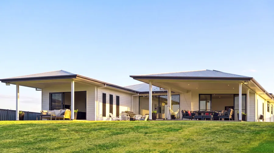 The home and covered outdoor living seen from the garden