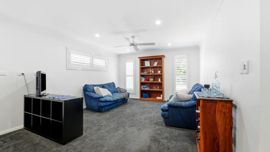 A separate carpeted living room
