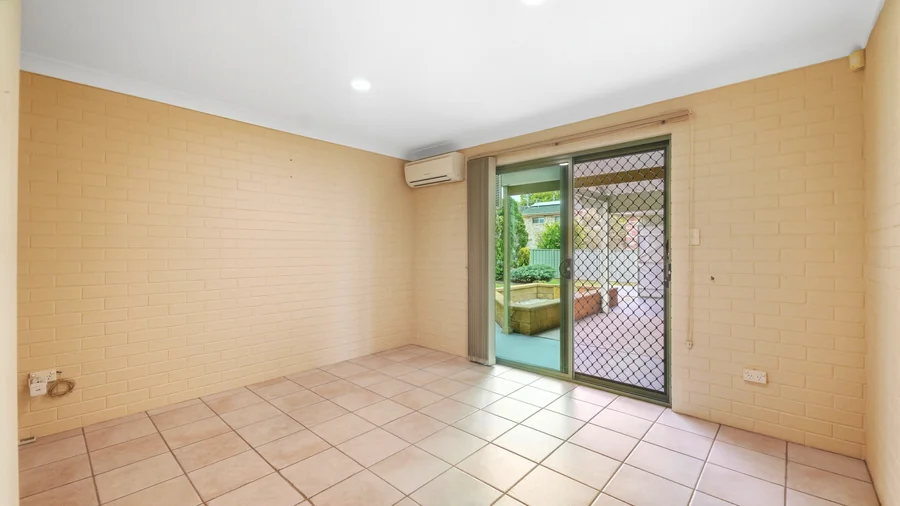 Tiled room with a sliding external door